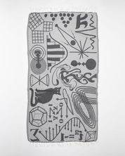 A black and white Equations That Changed the World Turkish Towel by Cognitive Surplus with various designs on it.