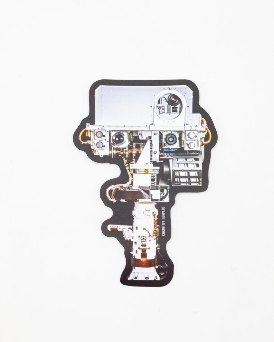 A Cognitive Surplus Curiosity Rover Head Sticker with an image of a machine on it.