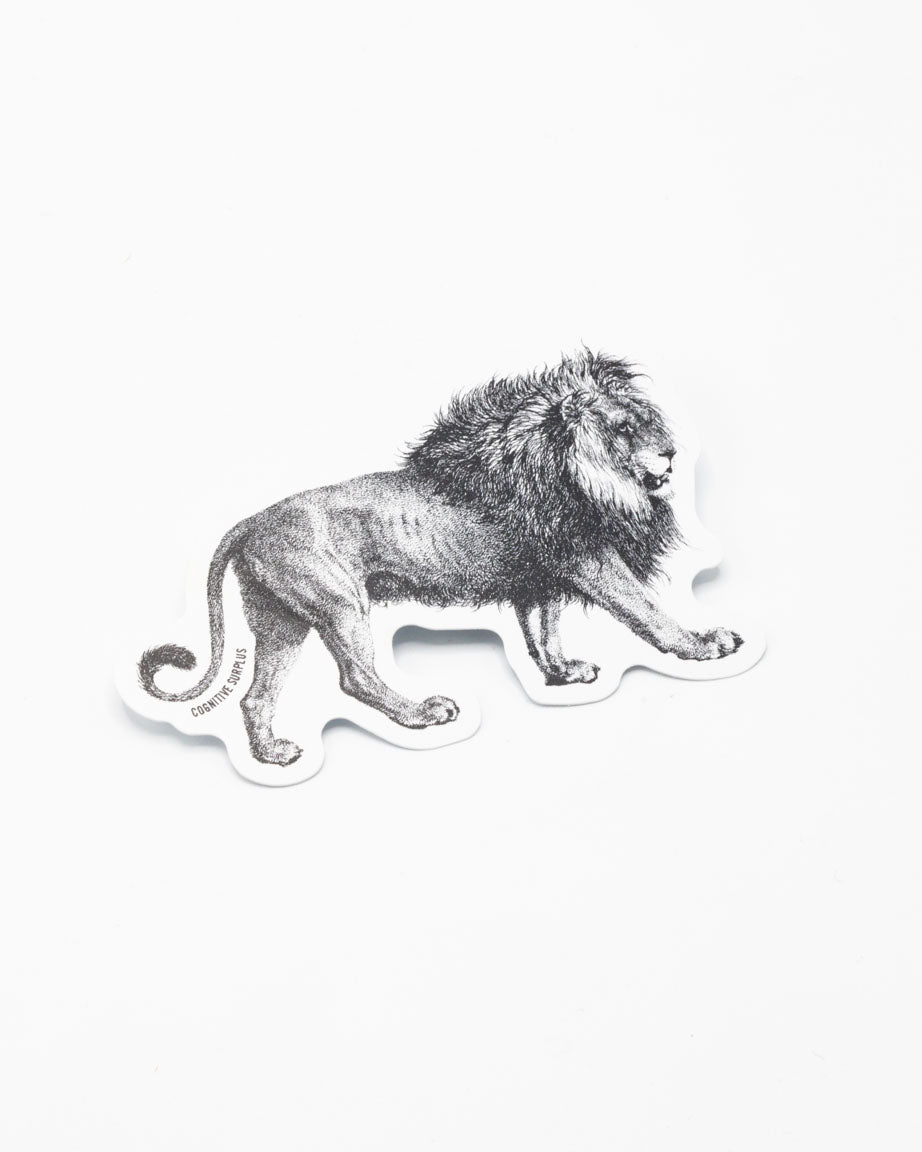 A black and white drawing of a Lion Sticker by Cognitive Surplus on a white surface.