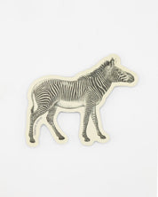 A Cognitive Surplus "Zebra Sticker" on a white surface.