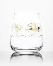 A SECONDS: Space Telescopes Wine Glass with a gold design on it from Cognitive Surplus.