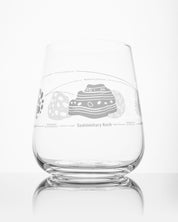 A SECONDS: Rock Cycle Wine Glass by Cognitive Surplus with a design on it.